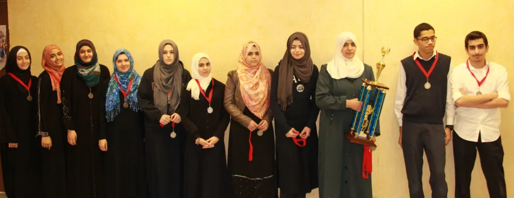 Universal School students wearing WYSE competition medals
